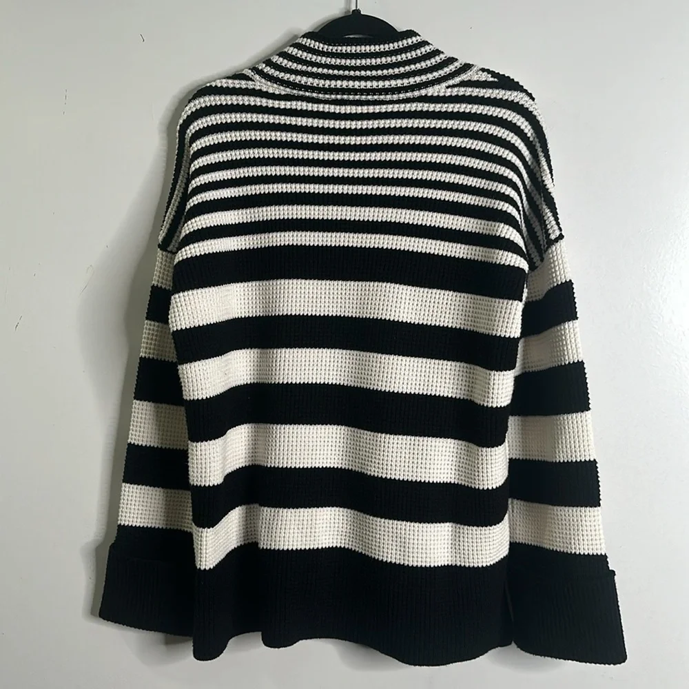 Devotion by cyrus black and white striped sweater size medium